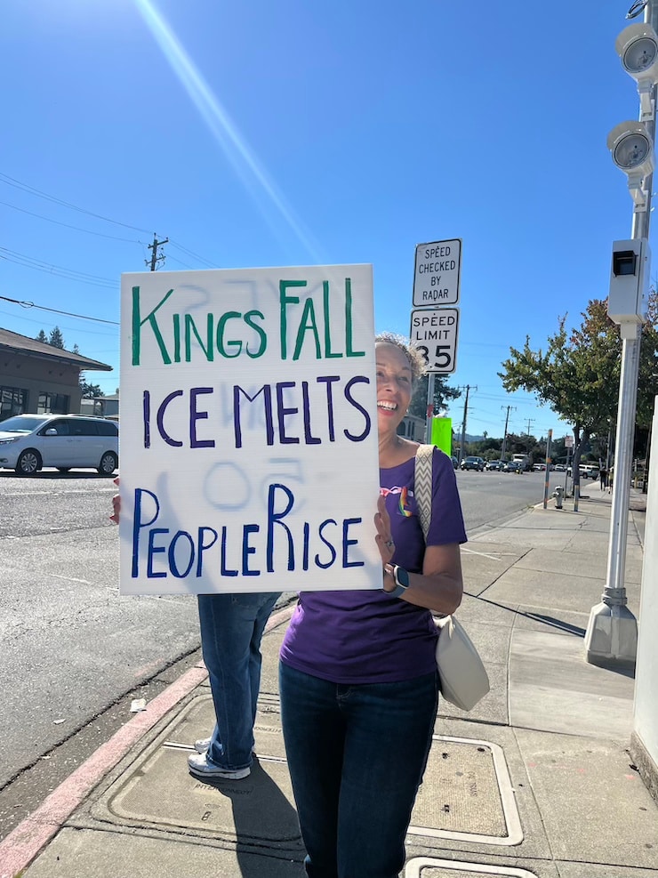 Gina O. of American Canyon's Soroptimist women's group protests ICE at Napa's Trancas St. No Kings rally. Griffin Jones photo