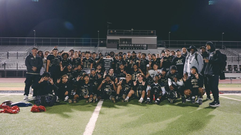 American Canyon Wolves football team gathered on the field