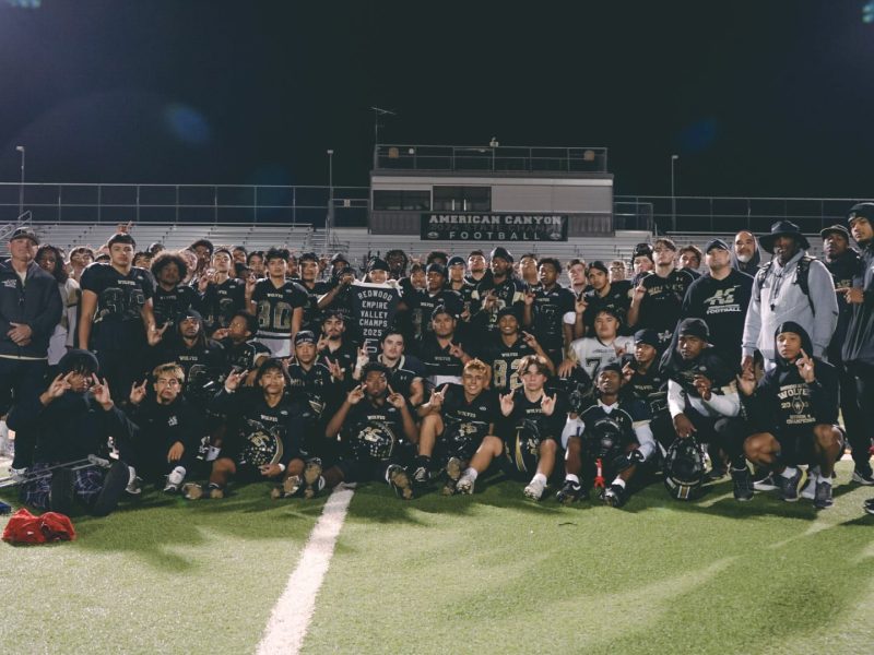 American Canyon Wolves football team gathered on the field