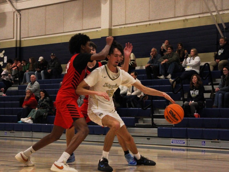 Napa High boy's basketball senior player Will Flynn is double-teamed on Dec. 16. Kyle Foster photo