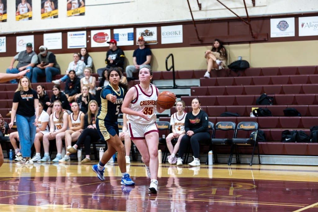 Vintage sophomore Sammie Kennedy dribbles past Napa High defender. Eric Thompson, Shamboozled.com photo