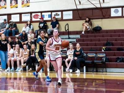 Vintage sophomore Sammie Kennedy dribbles past Napa High defender. Eric Thompson, Shamboozled.com photo