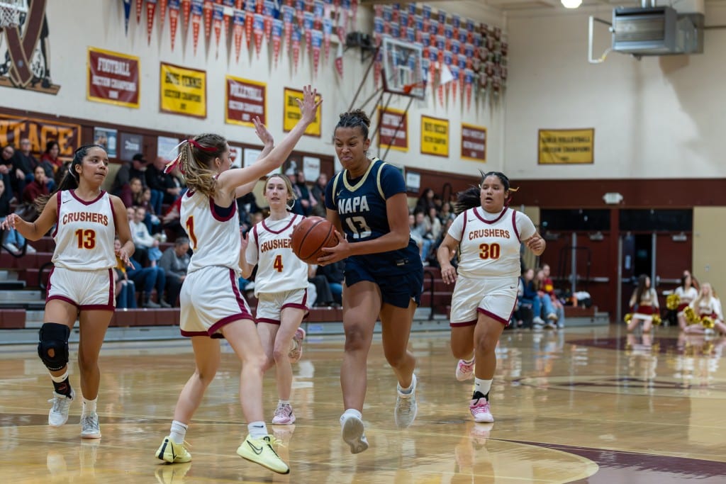 Senior center Margaux Bontia of Napa High drives against Vintage High. Eric Thompson, Shamboozled.com photo
