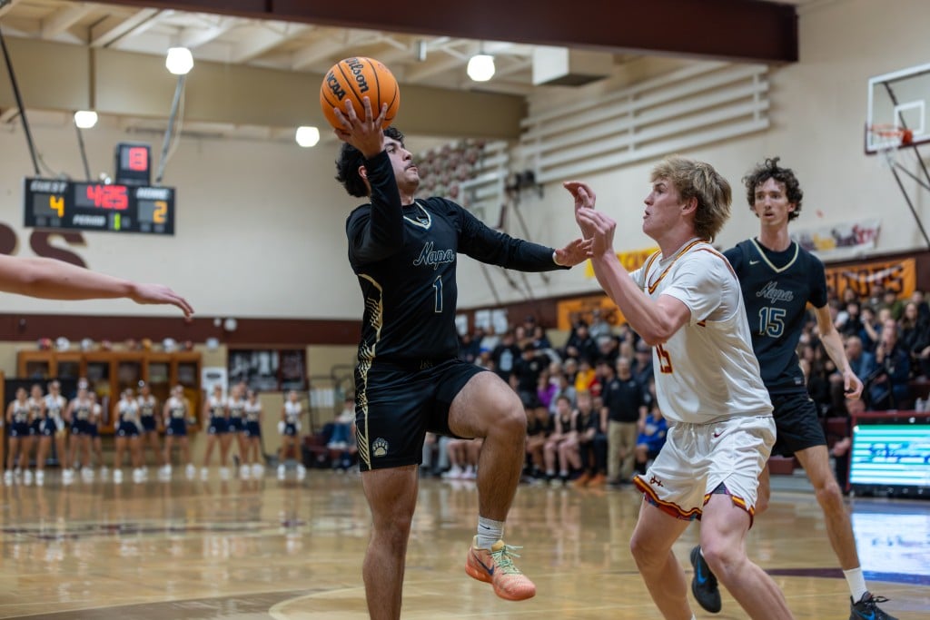 Napa High School's senior guard Cris Rendon lays up a shot against Vintage High School on Jan. 26. Eric Thompson, Shamboozled.com photo