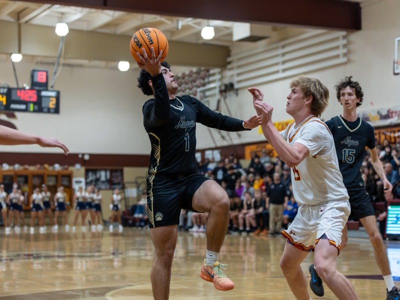 Napa High School's senior guard Cris Rendon lays up a shot against Vintage High School on Jan. 26. Eric Thompson, Shamboozled.com photo