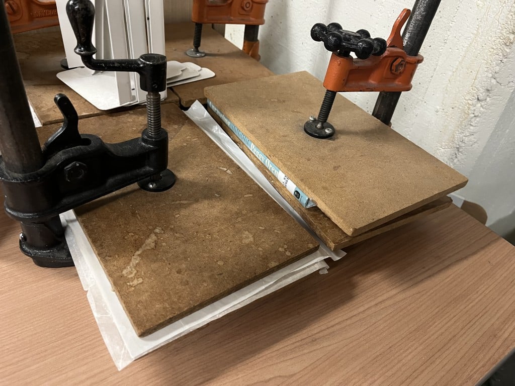 Books are pressed, following repair at the Napa County Library. Anthony Halstead photo