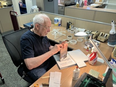 Michael “the Mender” Herzog helps keep the shelves of the Napa County Library in working order. Anthony Halstead photo